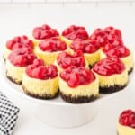 Mini Cherry Cheesecakes on a cake stand