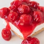 a piece of No Bake Cherry Cheesecake on a plate