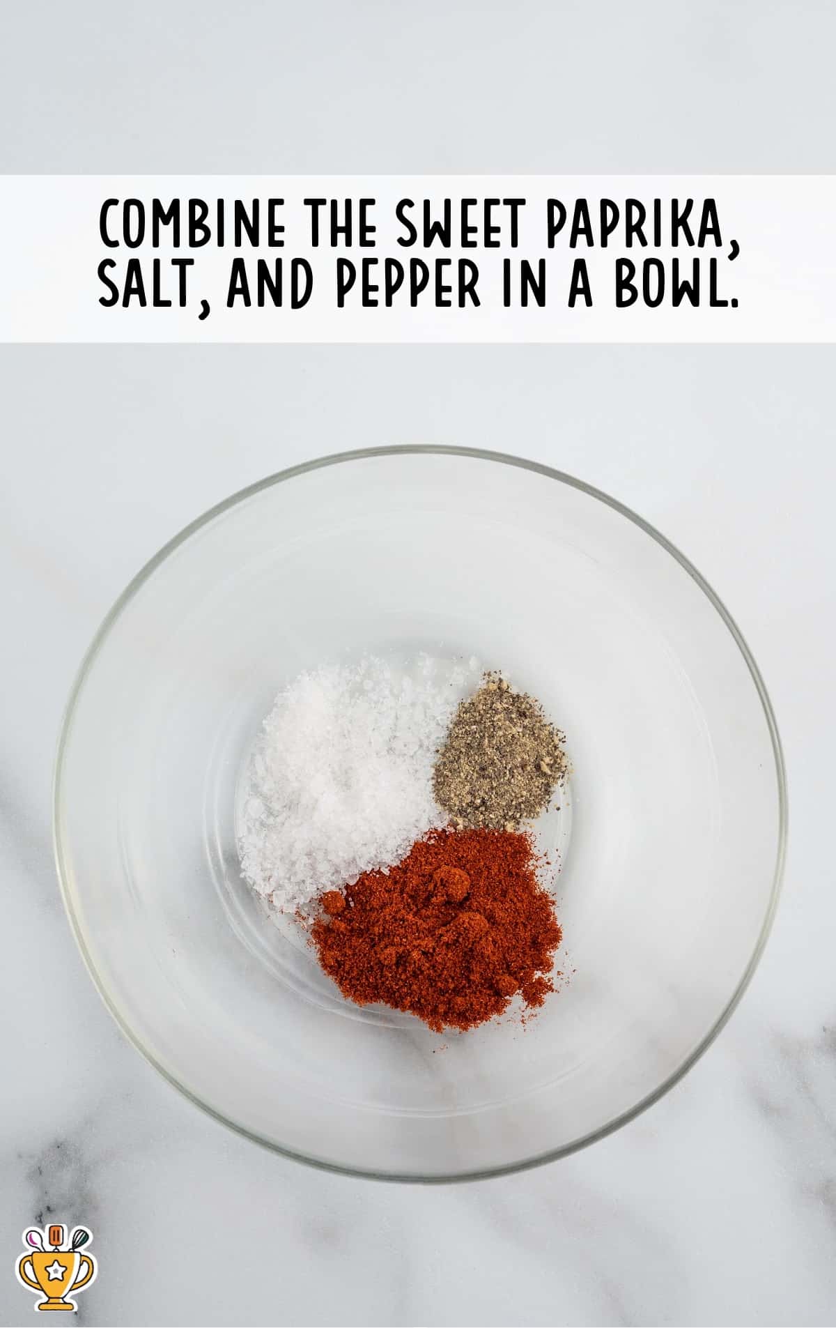 sweet paprika, salt and pepper in a clear bowl