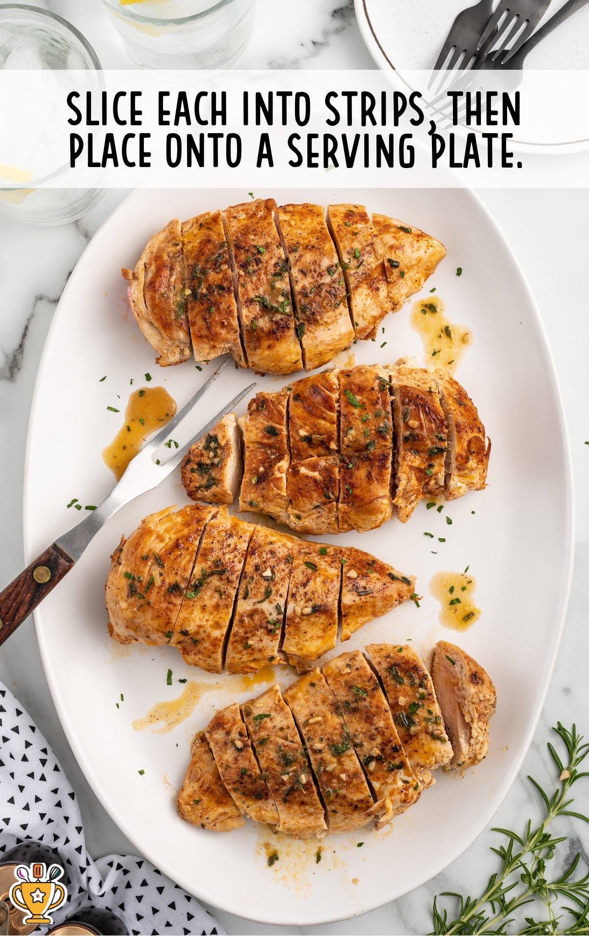 Pan Seared Chicken sliced into strips and placed on a serving plate
