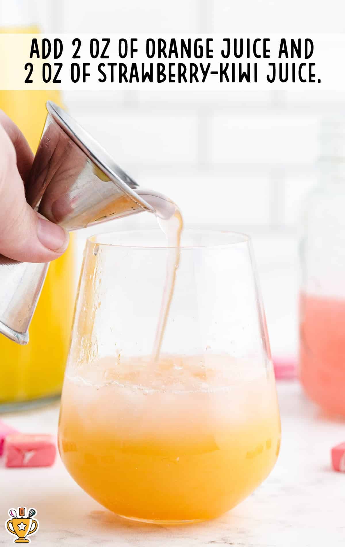 pouring orange juice into a glass
