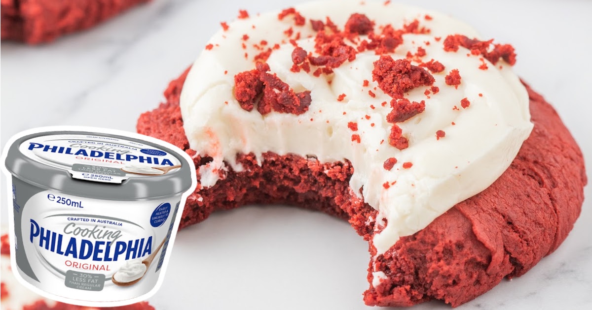 a Red Velvet Cream Cheese Cookie with a bite on it