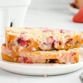two pieces of Strawberry Bread on a white plate
