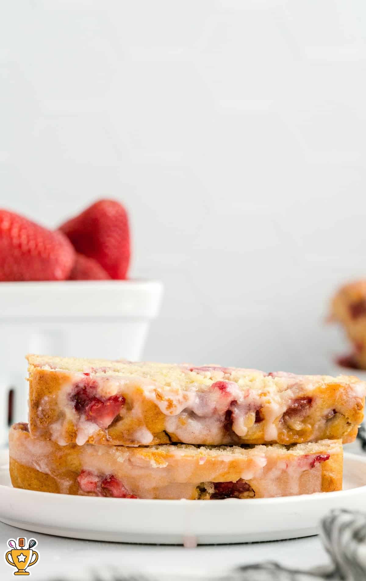 two pieces of Strawberry Bread on a white plate