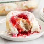 a piece of Strawberry Cinnamon Rolls on a plate