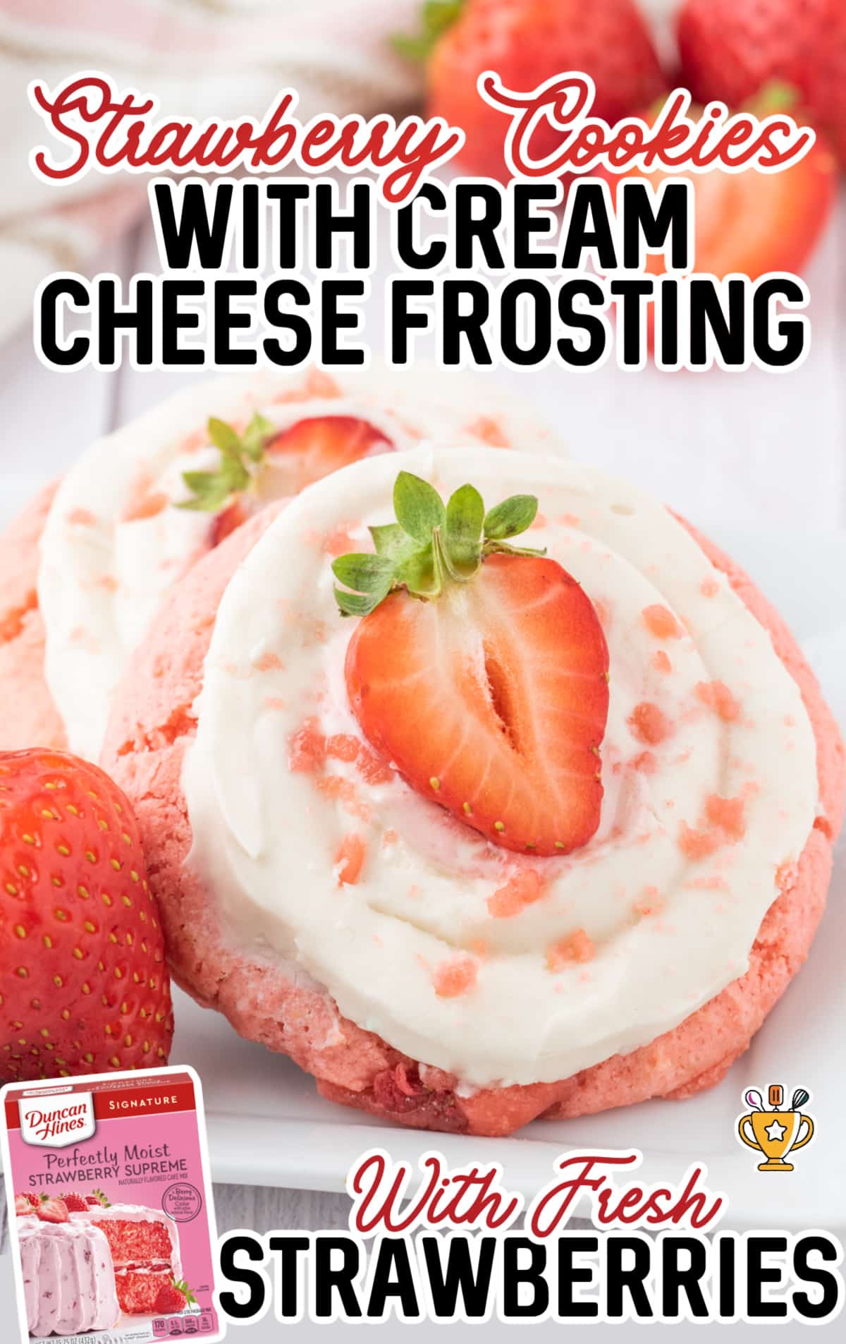Strawberry Cookies with Cream Cheese Frosting on a white plate. 
