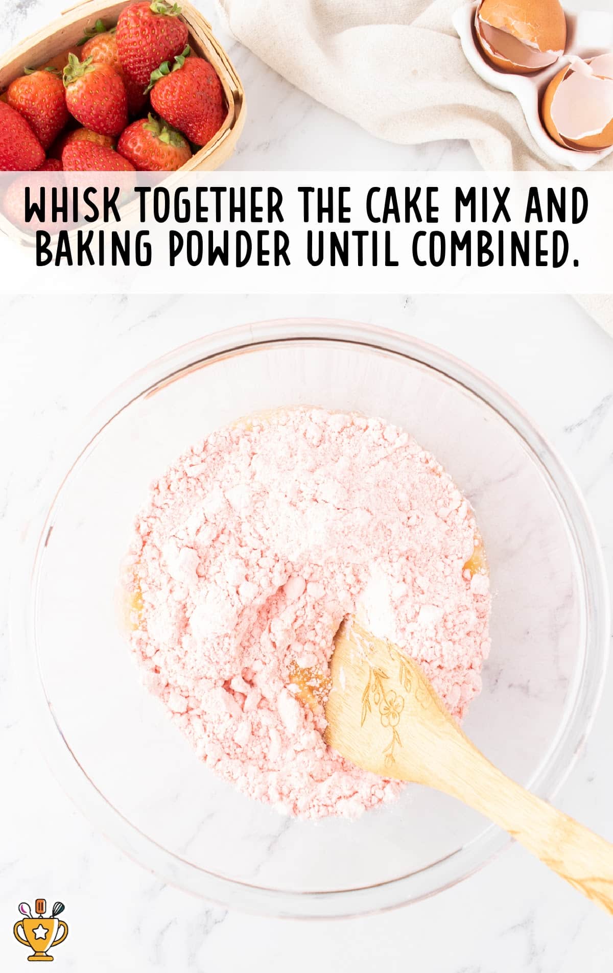 whisking together cake mix and baking powder in a bowl