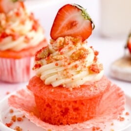 a Strawberry Crunch Cupcake on a plate