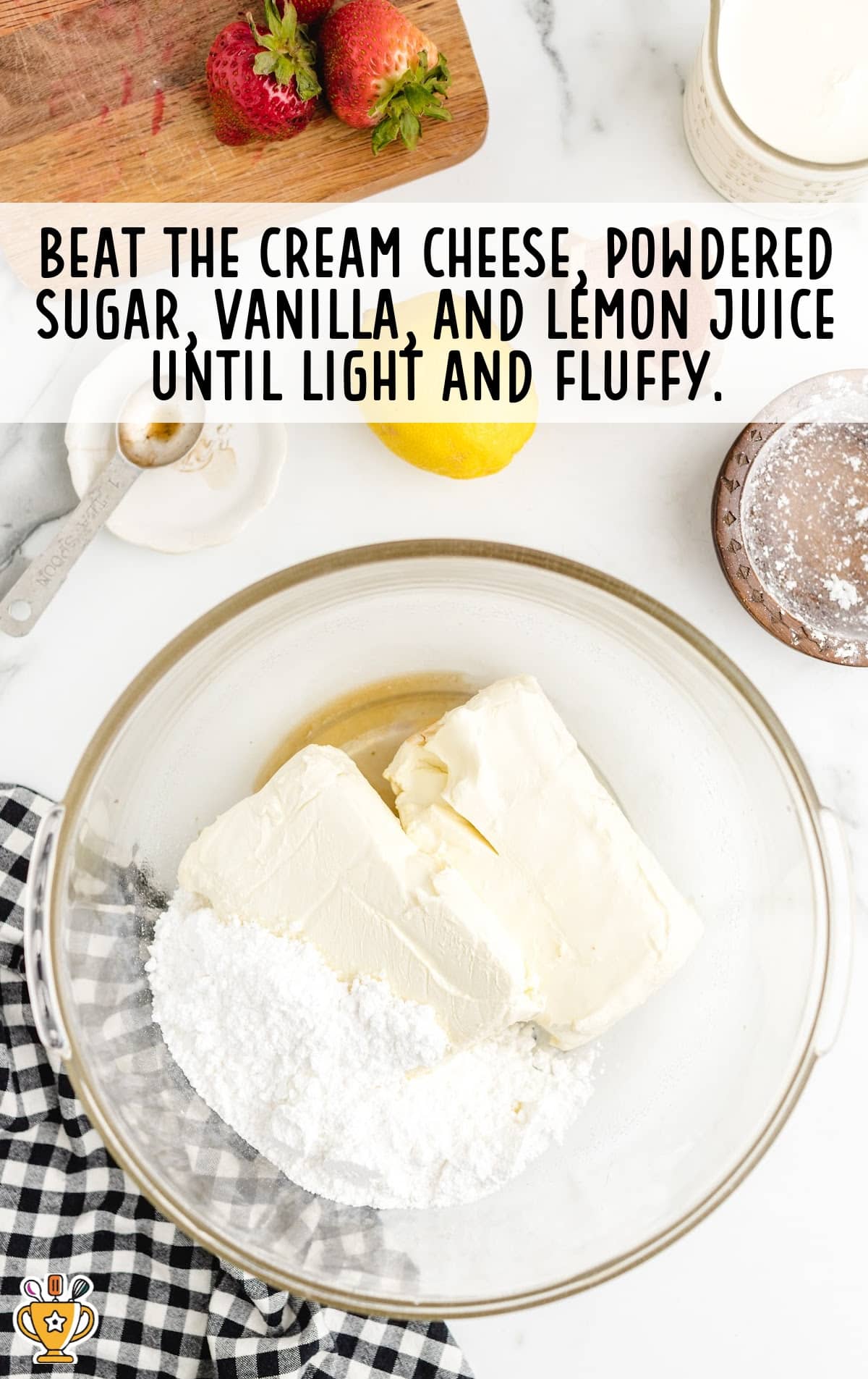 cream cheese, powdered sugar, vanilla and lemon juice mixed together in a bowl