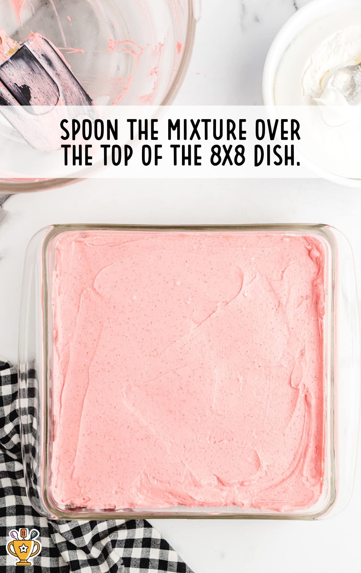 spooning the mixture over the top in a baking dish