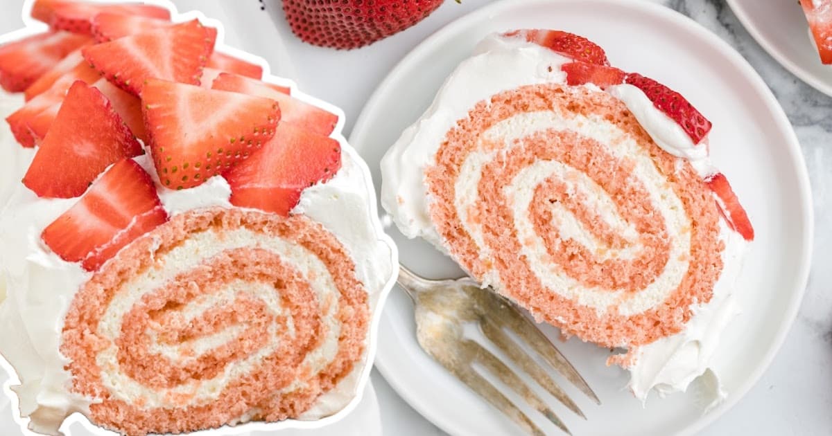 a piece of Strawberry Roll Cake on a plate with a fork