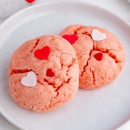 2 Valentine Cookies on a plate.