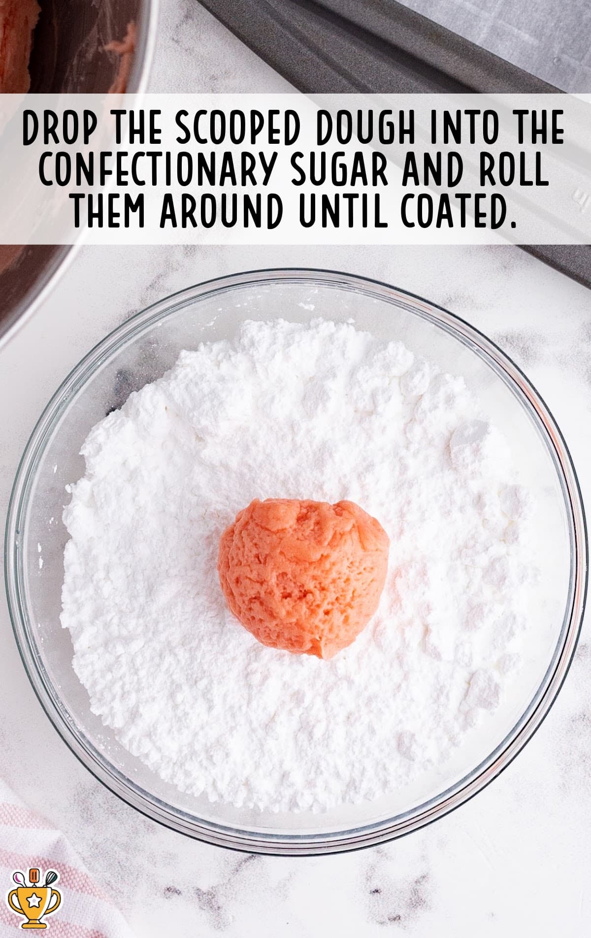 A Valentine Cookie dough ball rolled in sugar.