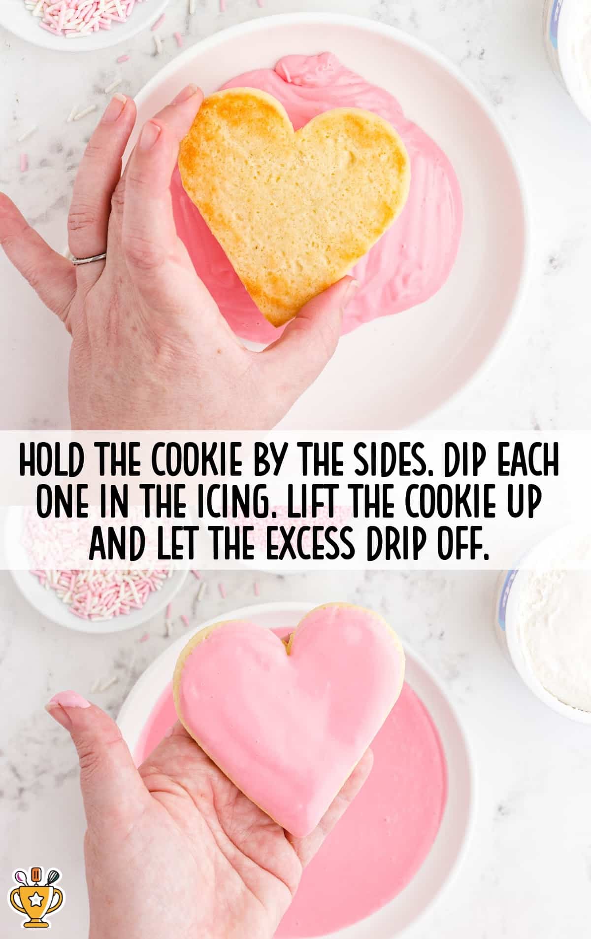 two hands holding Valentine Sugar Cookies