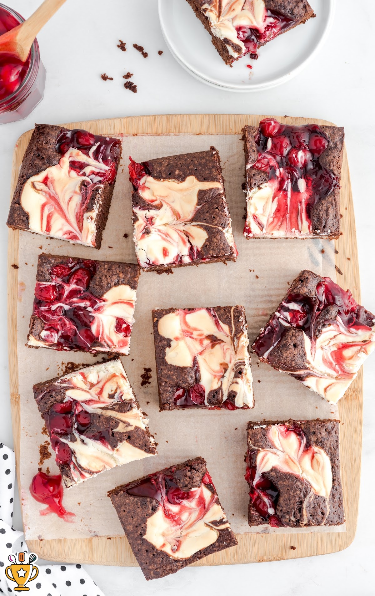 An overhead shot of Cherry Cheesecake Brownies sliced.
