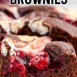 Cherry cheesecake brownies on a cutting board.