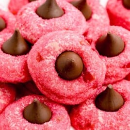 a bunch of Cherry Kiss Cookies on a plate