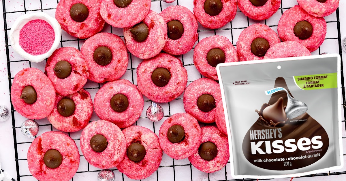 a bunch of Cherry Kiss Cookies on a cooling rack