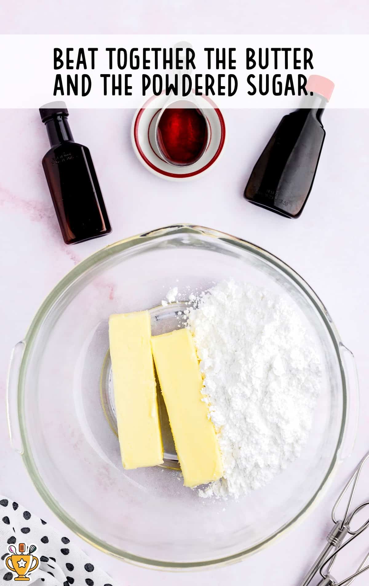 butter and powdered sugar in a clear bowl