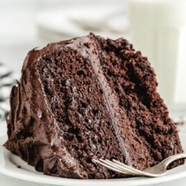 a piece of Chocolate Mayonnaise Cake on a plate with a fork