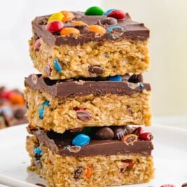 a stack of No Bake Monster Cookies on a white plate