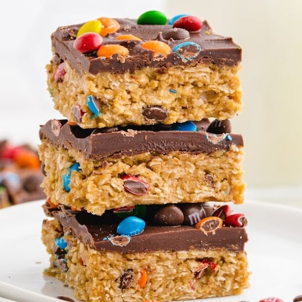 a stack of No Bake Monster Cookies on a white plate