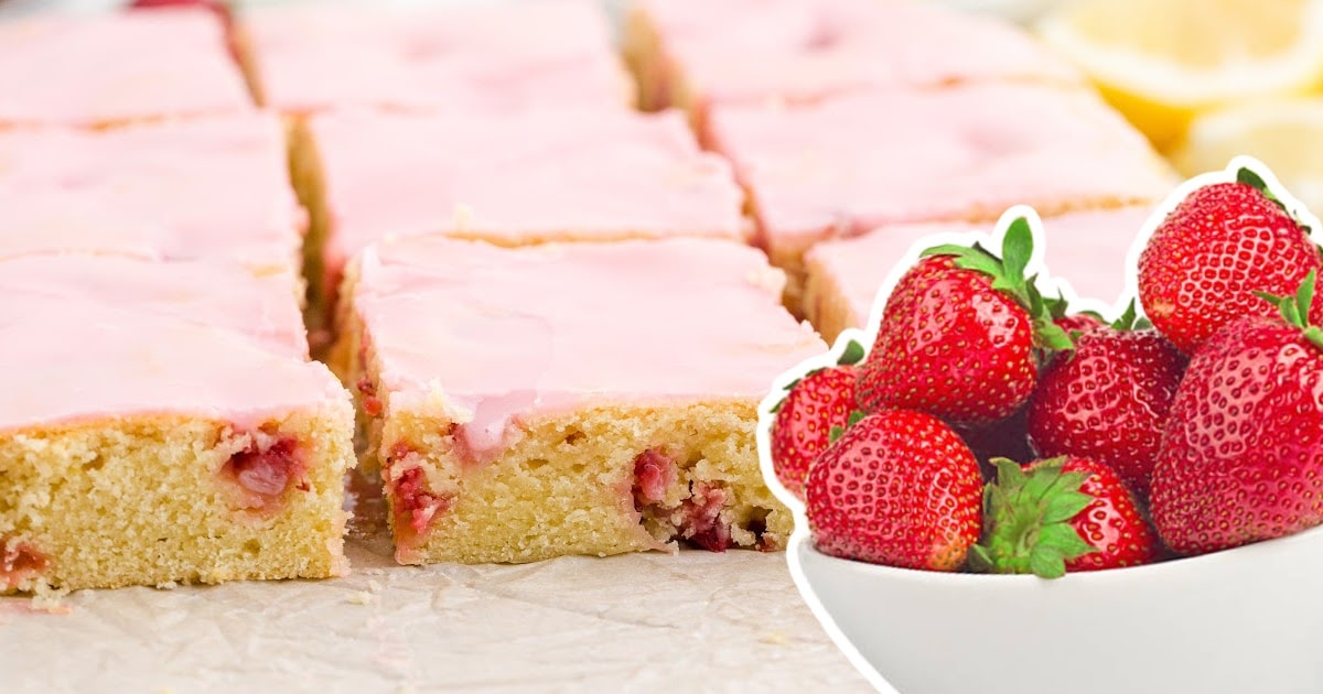 pieces of Strawberry Lemon Blondies and a bowl full of strawberries