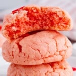 A stack of Valentine Cookies on a desssert plate.