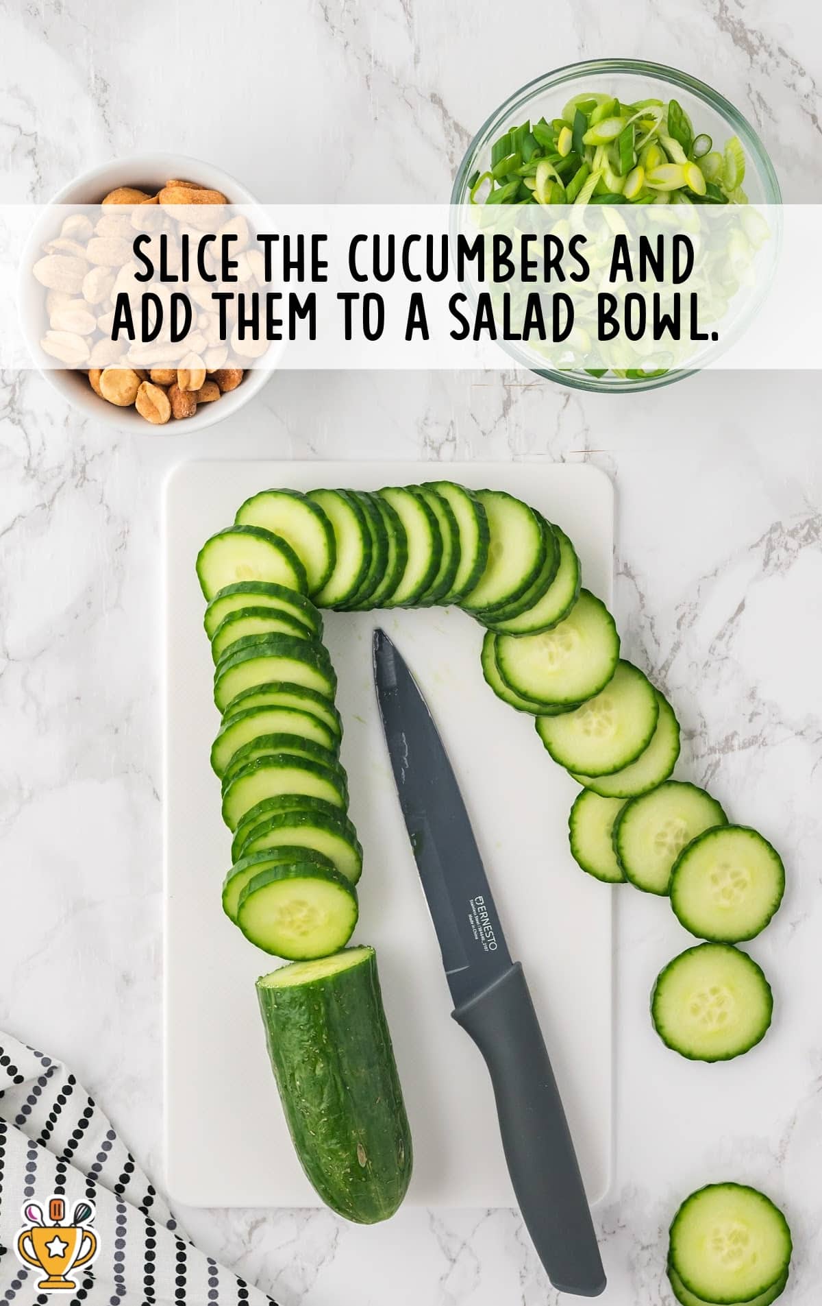 sliced cucumbers on a cutting board with a knife on the side