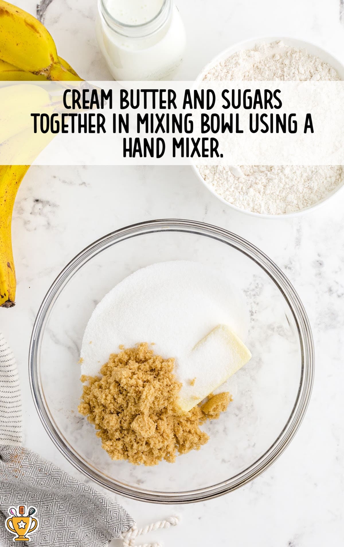 creaming butter and sugars together in a mixing bowl