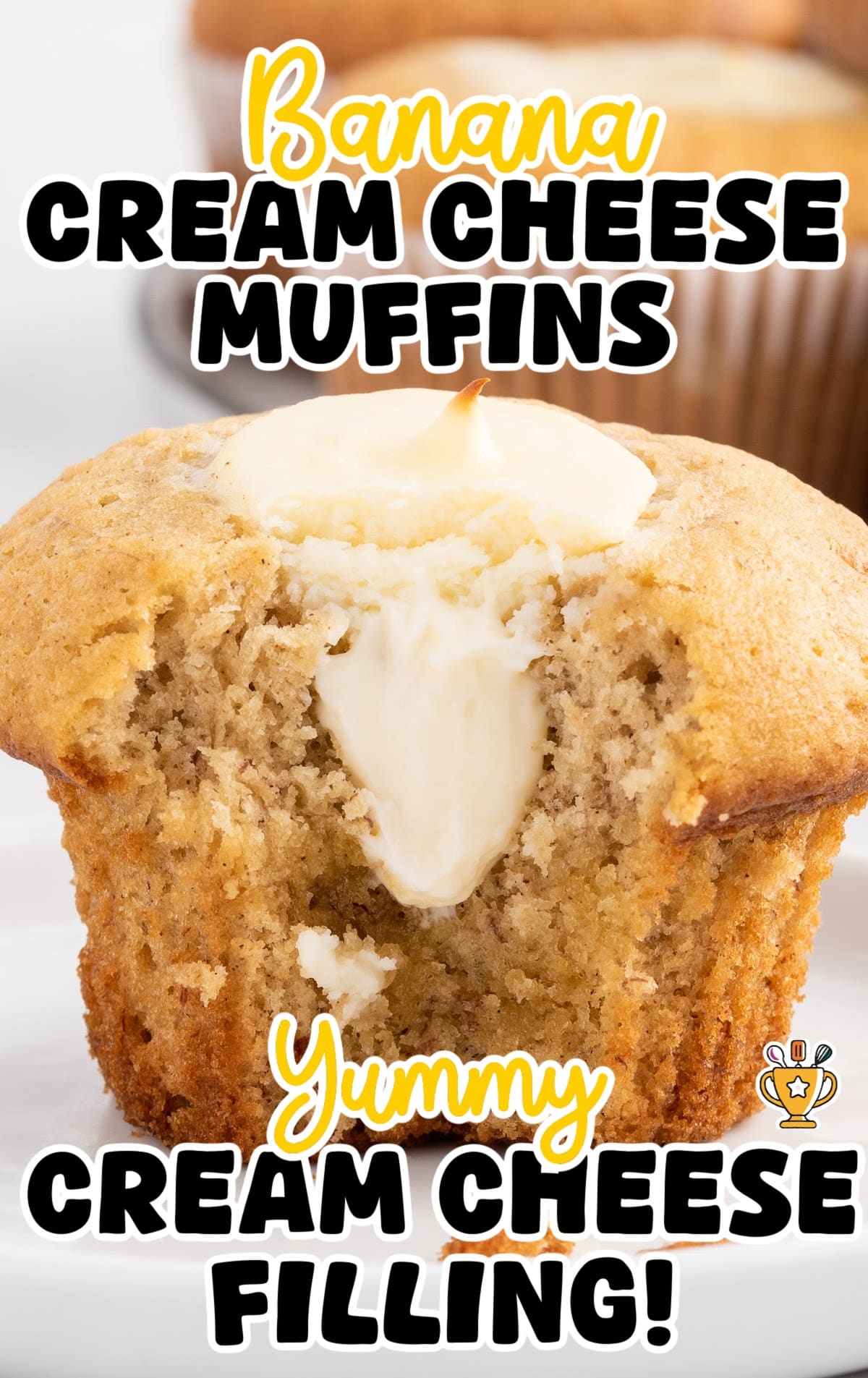a Banana Cream Cheese Muffin with a bite on it