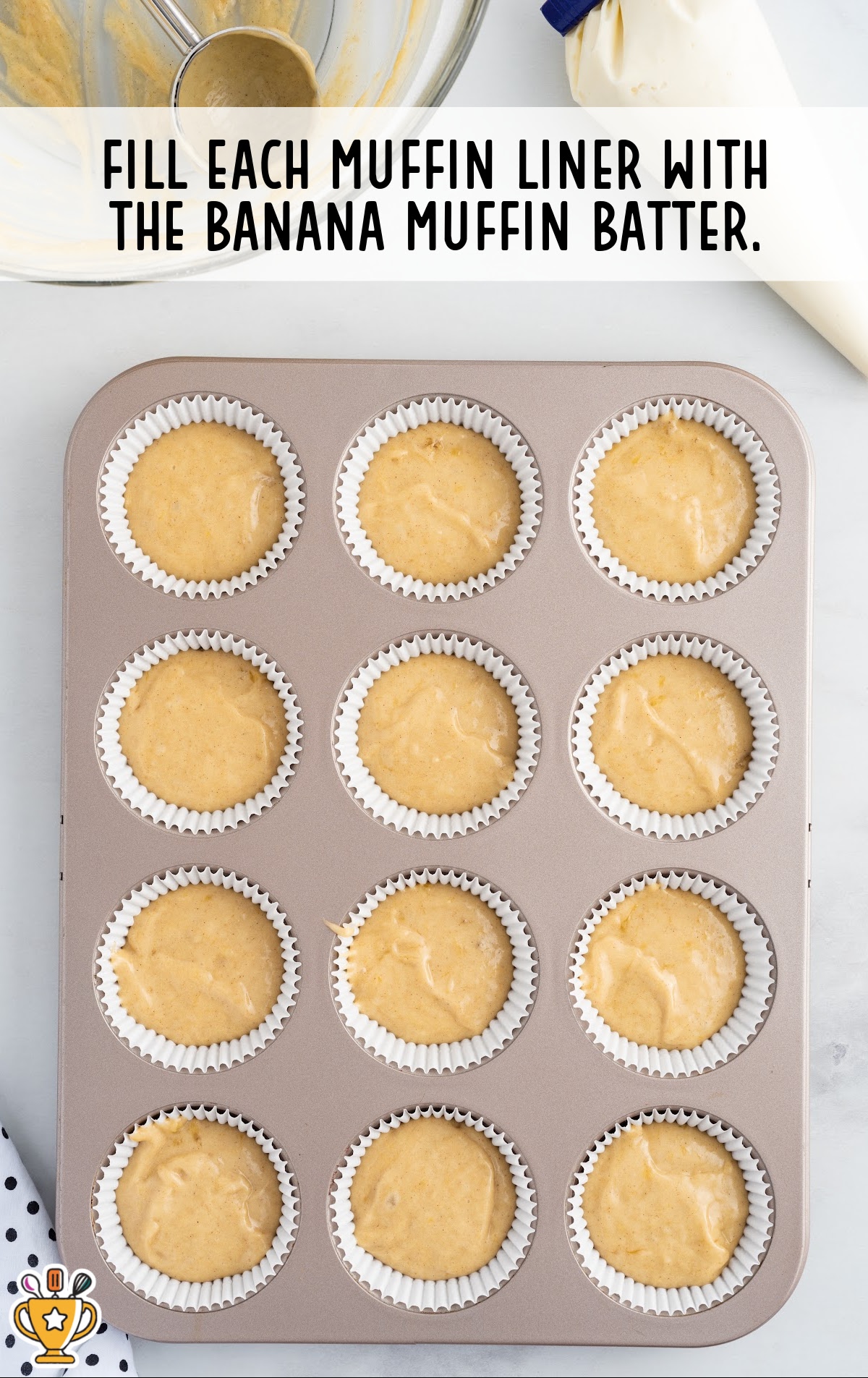muffin liners filled with the banana muffin batter