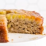 a Banana Upside Down Cake with a cut piece