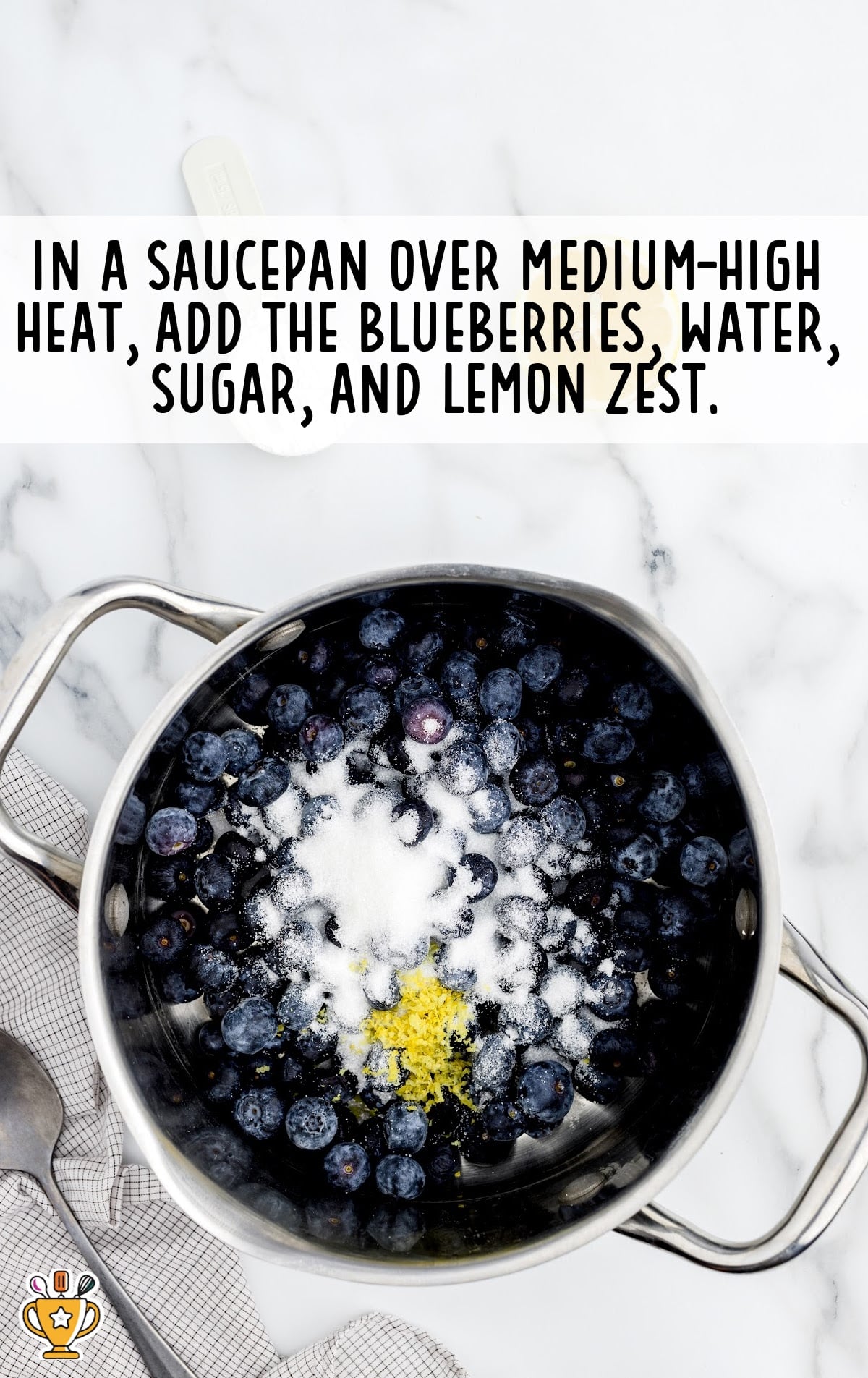 blueberries, water, sugar and lemon zest added in a saucepan