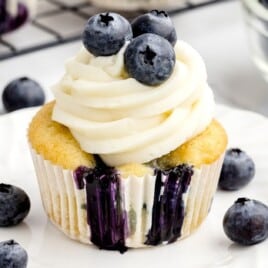 a Blueberry Cupcake on a white plate