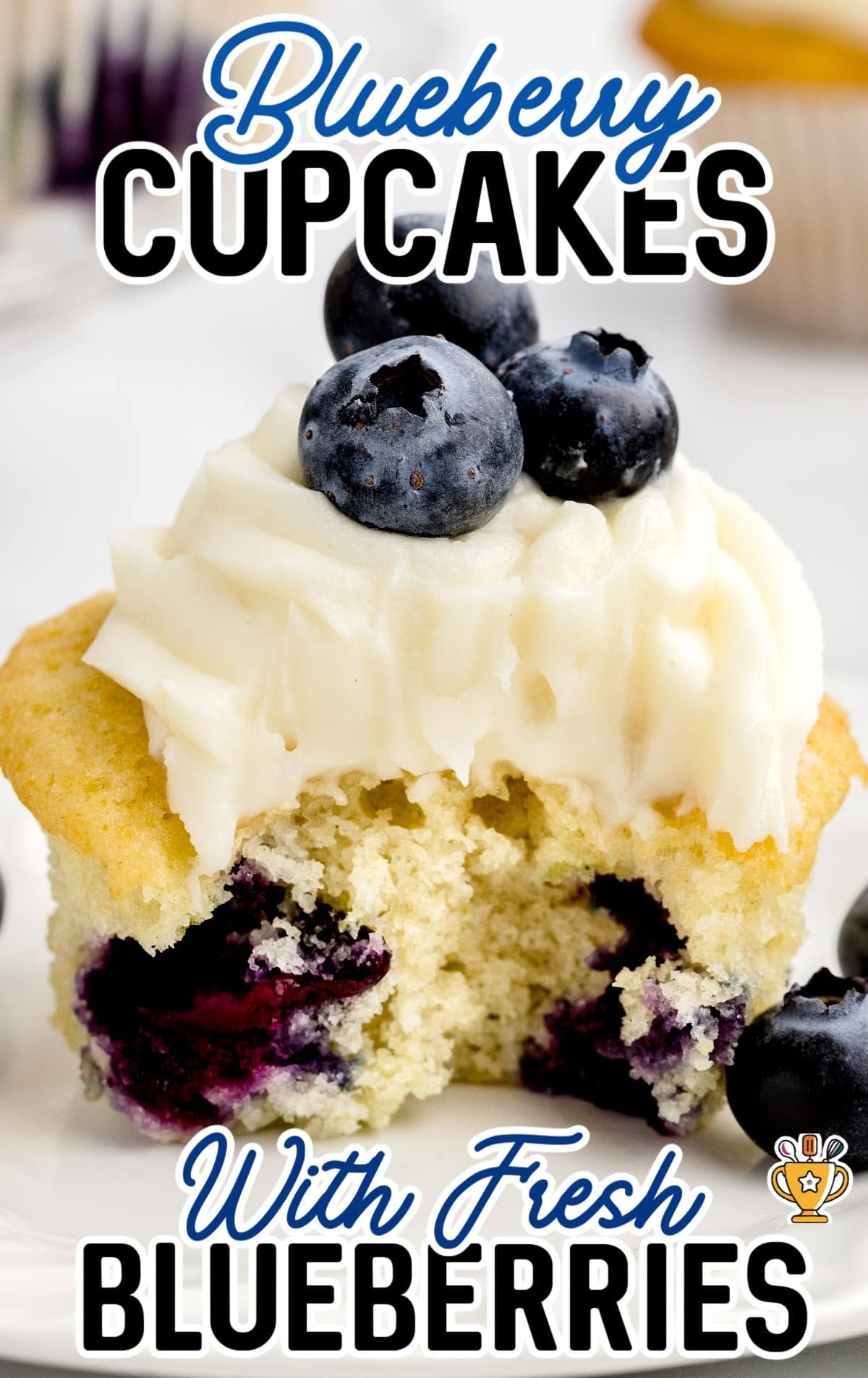a Blueberry Cupcake with a bite on it