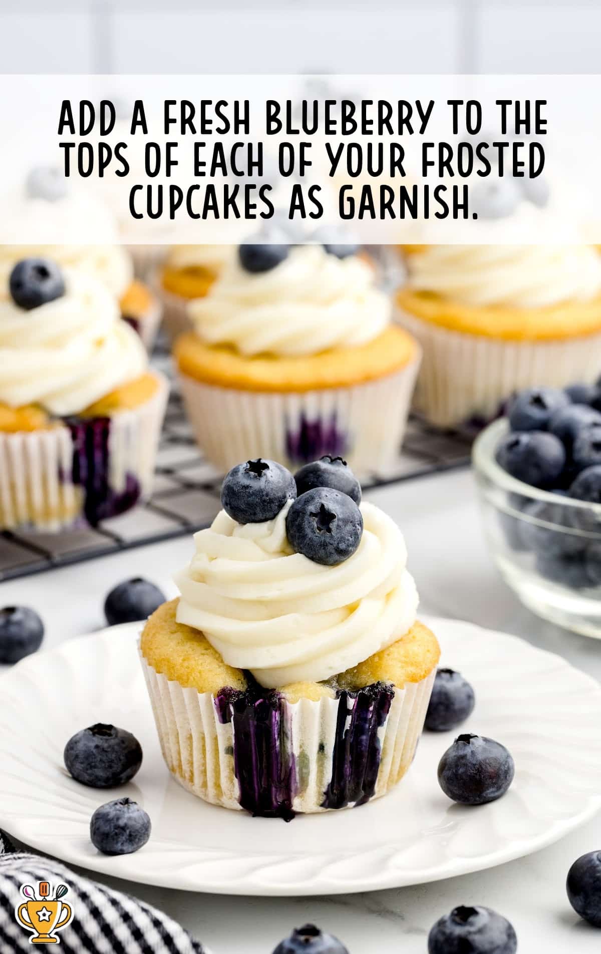 a Blueberry Cupcake on a white plate