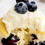 a Blueberry Cupcake with a bite on it