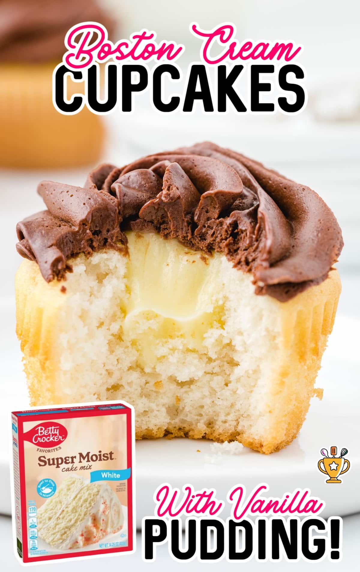 a Boston Cream Cupcake with a bite on it