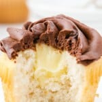 a Boston Cream Cupcake with a bite on it