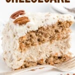 a piece of Carrot Cake Cheesecake on a plate with a fork