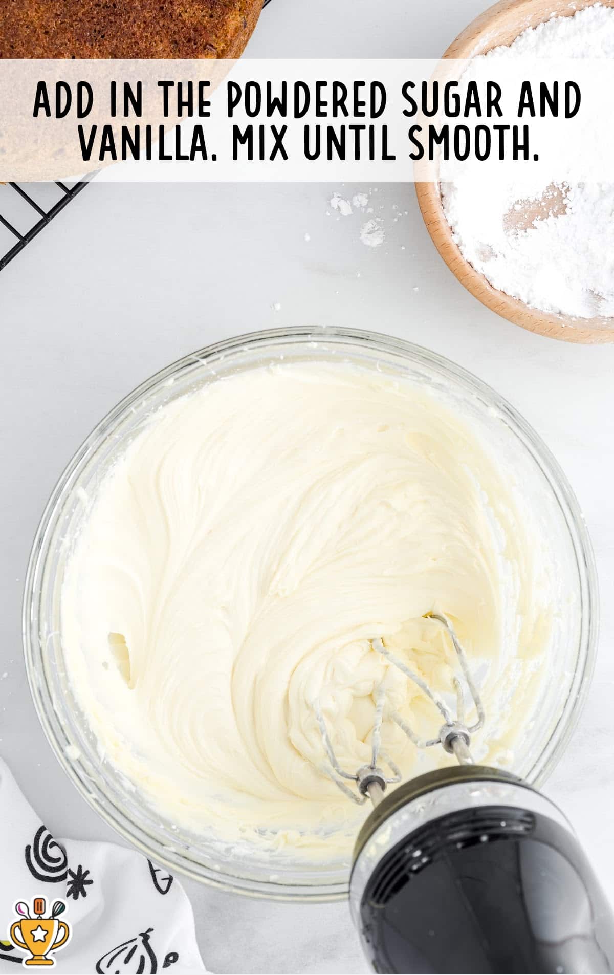 powdered sugar and vanilla added in a bowl