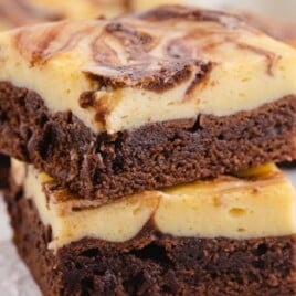 two Cheesecake Brownies stacked together