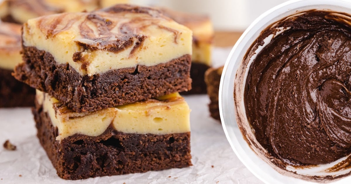two Cheesecake Brownies stacked together