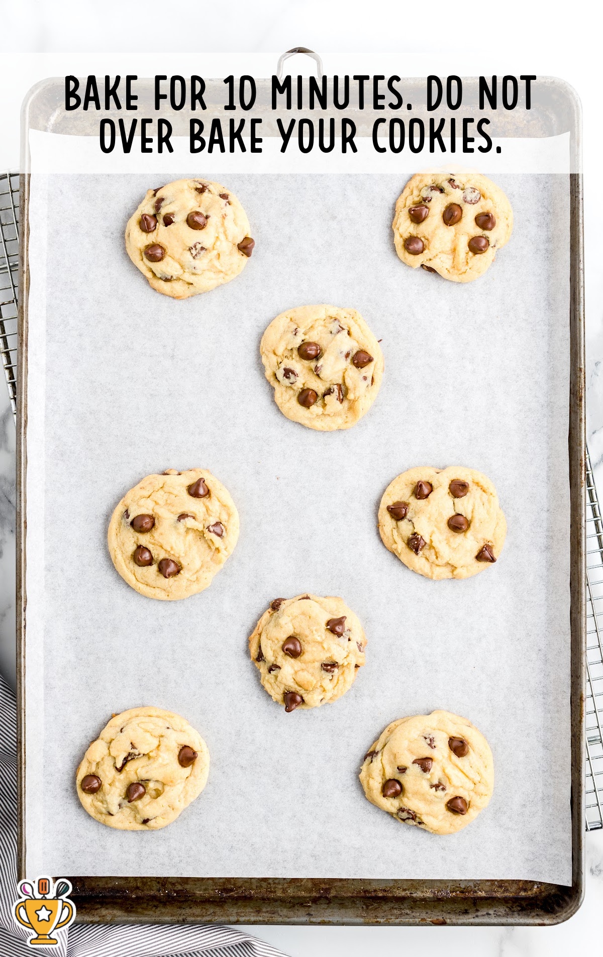 baked chocolate chip pudding cookies on a baking tin