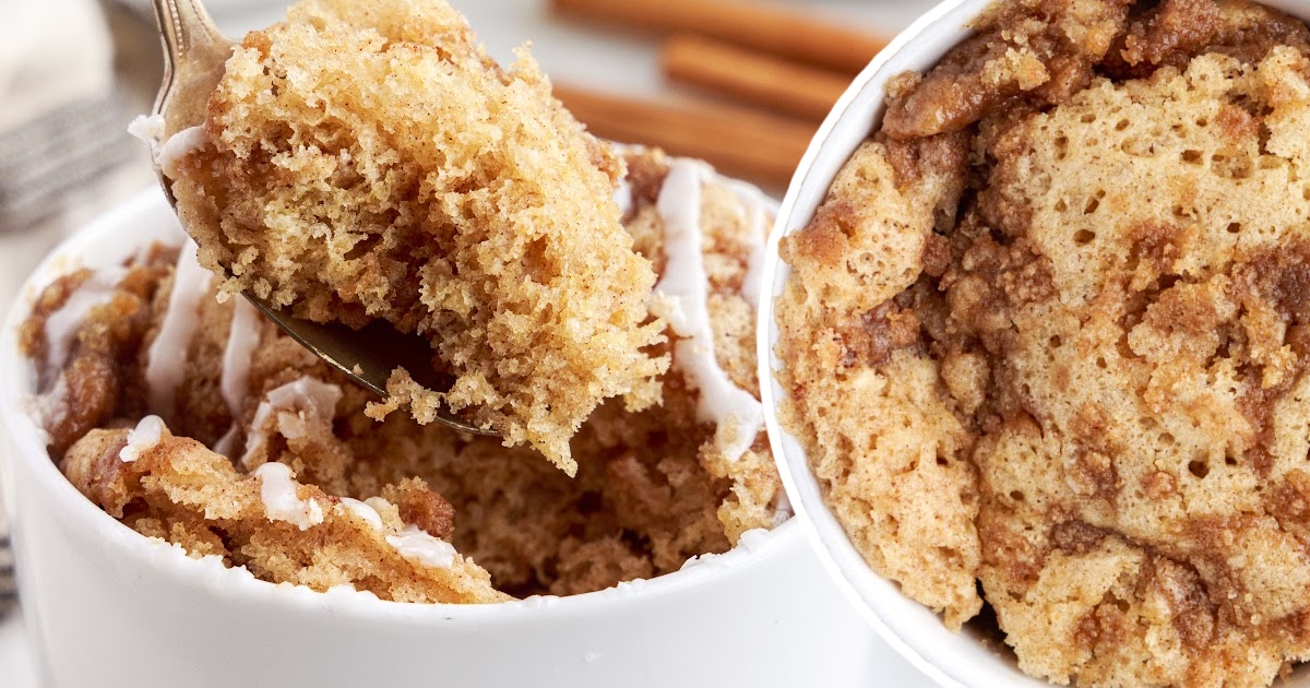 Coffee Cake in a Mug with a spoon holding some