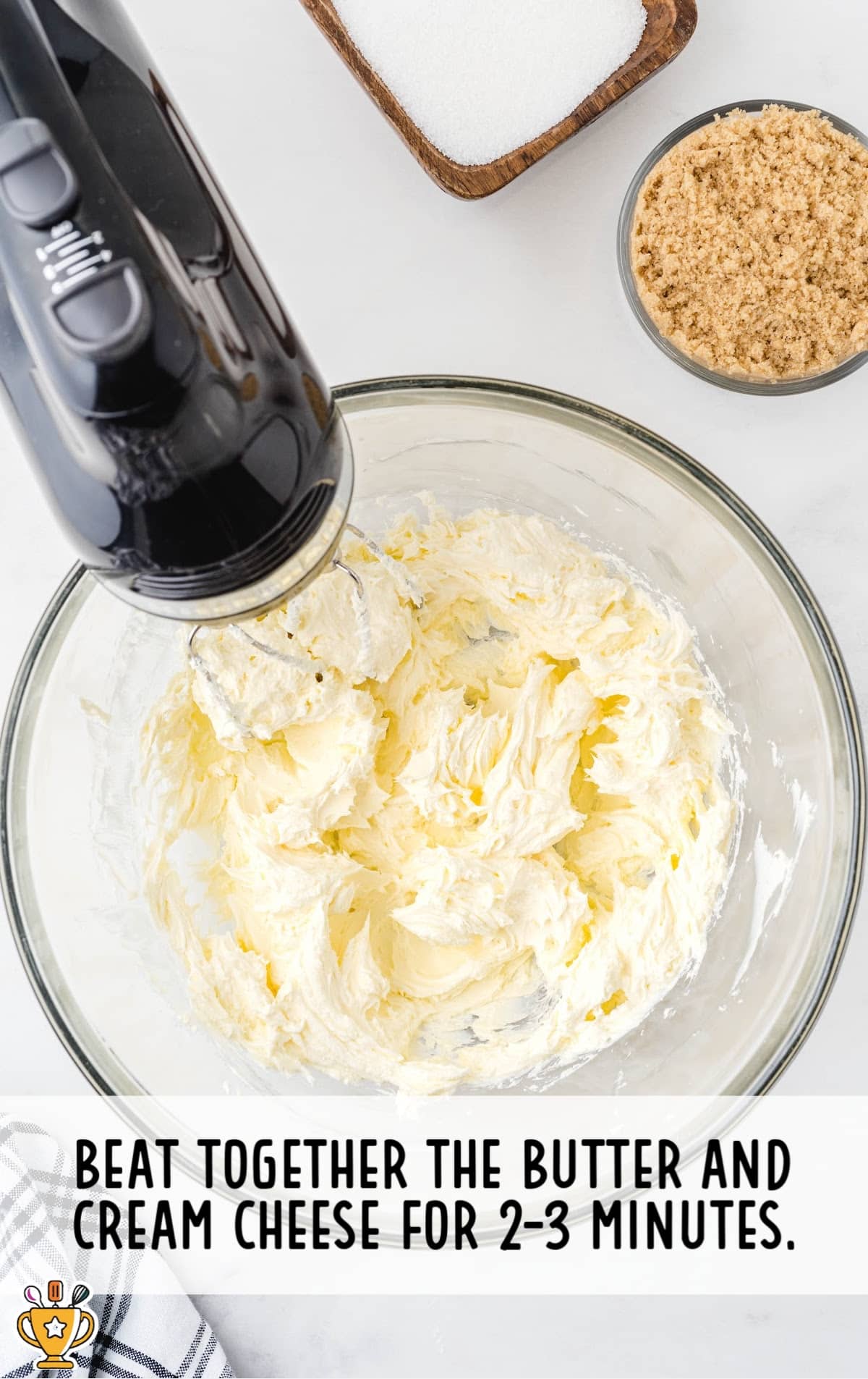 butter and cream cheese beaten together in a bowl