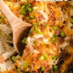 a wooden spoon holding some Crockpot Crack Chicken