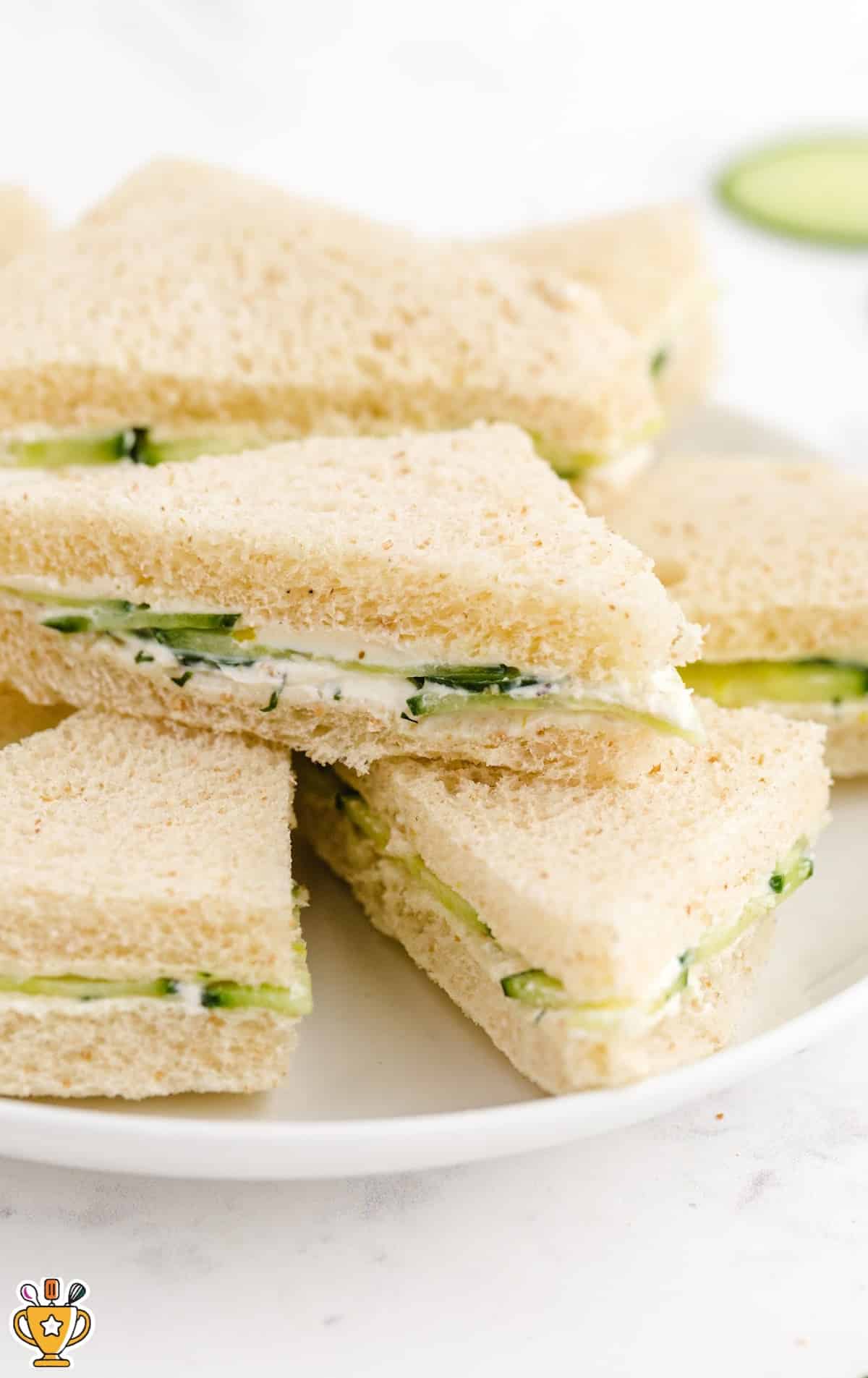 Cucumber Sandwiches on a white plate