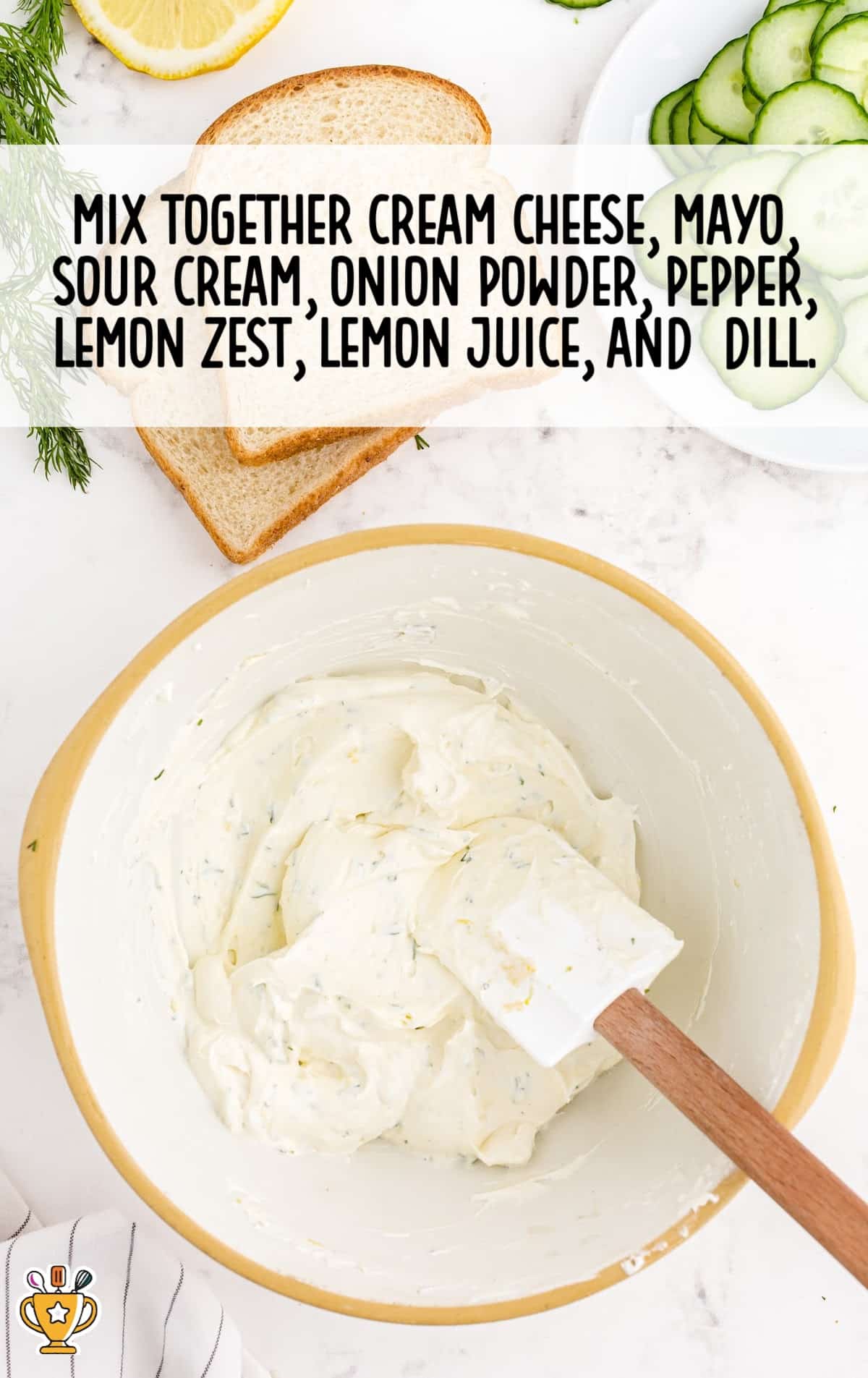 mixing cream cheese, mayo, sour cream, onion powder, pepper, lemon zest, lemon juice and dill in a bowl